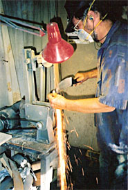 Mike at the belt sander