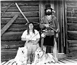 Padre & Coyote Woman at their remote log home in the mountains of North Idaho