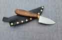 The "Hunter Buddy" has 3" 1080 high carbon steel blade. Full tang handle w/ Portugal wood slabs. Comes with sheath!